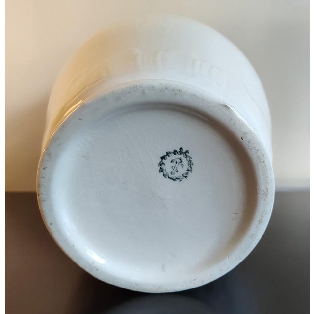 Acquired in 1963 in a Pennsylvania antique shop, this Ironstone Pitcher is in excellent condition given its age. The...