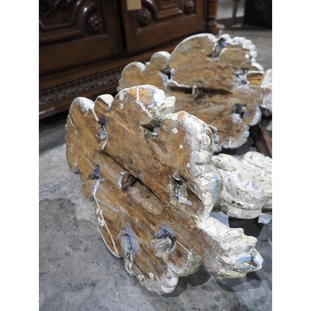 More information coming soon… This pair of bras de lumière, which was hand-carved in Italy during the 1700s, is full of...