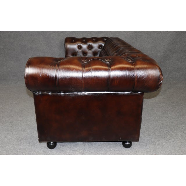 An exceptional example of modern English craftsmanship, this custom-made Chesterfield sofa is a masterfully executed...