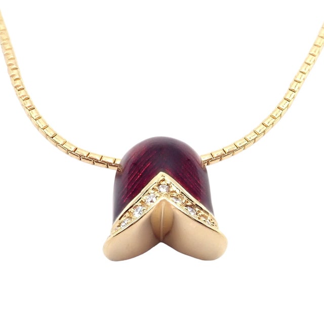 Fabergé Diamond Tulip Red Enamel Pendant Necklace The Fabergé Diamond Tulip Red Enamel Pendant Necklace is a breathtaking...