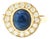 Late 20th-Century 18 Karat Yellow Gold Cabochon Blue Sapphire Halo Ring, Size 6.75 For Sale
