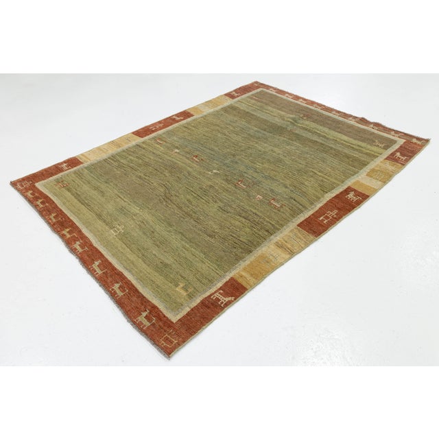 Modern Hand-Knotted Gabbeh Wool Rug – Earth Tones With Minimalist Animal Motifs For Sale - Image 4 of 8
