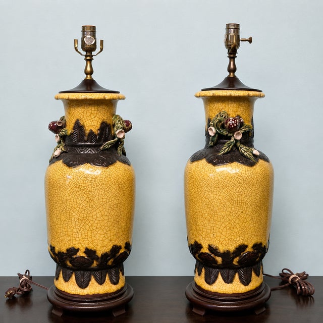 This is a lovely pair of large scale Chinese export style jar or vase form table lamps with beautiful applied fruit. They...