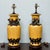 This is a lovely pair of large scale Chinese export style jar or vase form table lamps with beautiful applied fruit. They...
