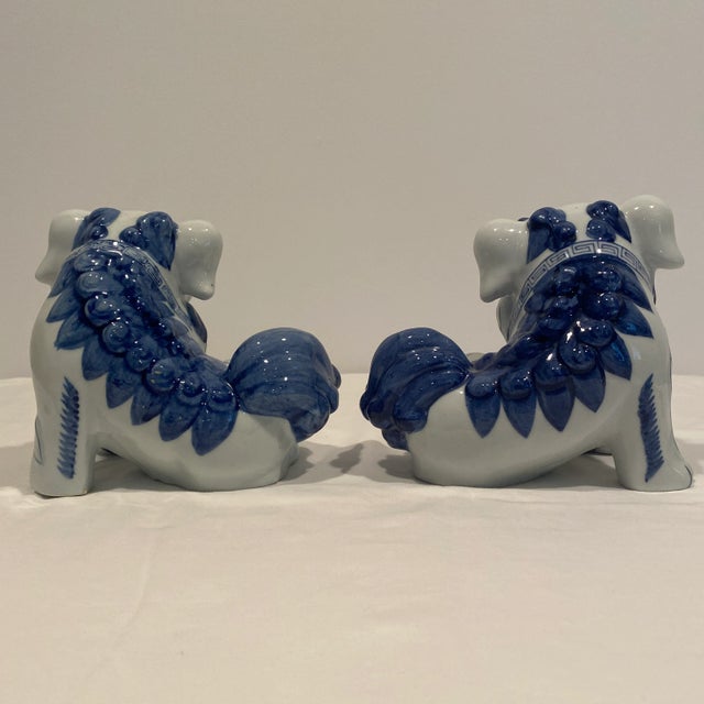 Asian Vintage Blue & White Ceramic Foo Dogs - A Pair For Sale - Image 3 of 13