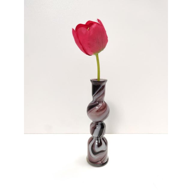 Made in Italy, 1970s. This vase is made in Murano glass. It might show slight traces of use since it's vintage, but it can...