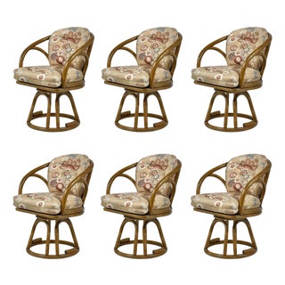 Set of Six Brown Jordan Rattan Swivel Armchairs For Sale