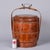 A Chinese three-tier stacking wedding basket (tí lán), circa 1900–1930. Coopered wood stave construction with rattan...