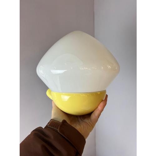 This exceptional wall lamp, model 6030, is a design by Swedish designer Sigvard Bernadotte for the renowned manufacturer...