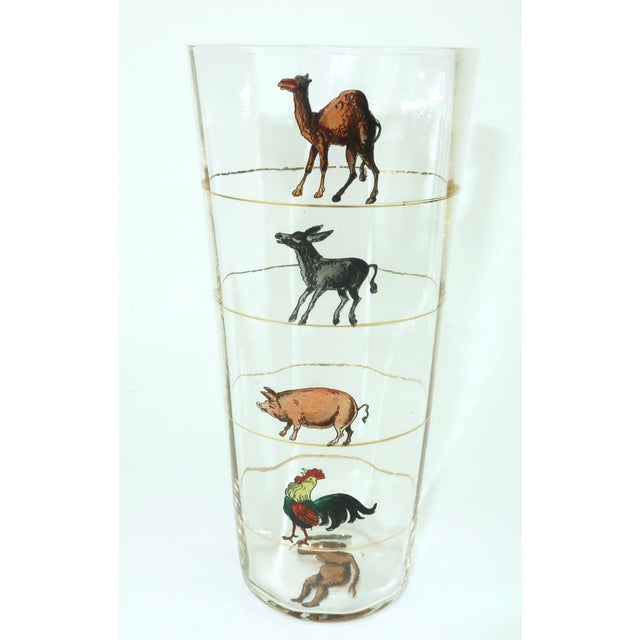 Bottoms up! Or should we say 'drink until you turn into a caveman!'. This humorous C.1930 barware glass measures your...