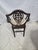A classic Hepplewhite-style shield back armchair featuring an elegant pierced splat and solid wood construction. This...