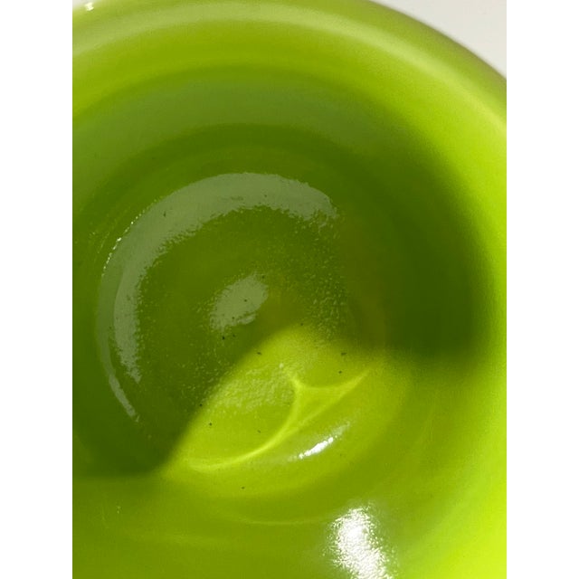 Bright and cheerful Fiesta Ware coffee cup in a vibrant chartreuse green glaze, featuring the classic ring handle and...