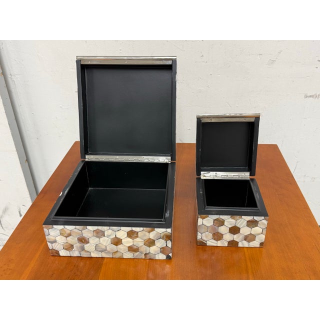 Design Plus Gallery presents a Two-Piece Mother of Pearl Boxes from Global Views. A mosaic of lustrous mother of pearl in...
