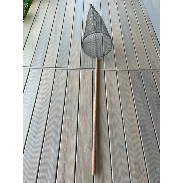 Very unique early 20th century vintage American industrial metal fish/minnow net. It’s comprised of a conical shaped wire...