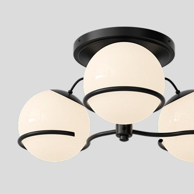 Model 2042/3 design by gino sarfatti the two blown opaline glass spheres are gently held in place by two black, or...