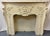 Wonderful antique architectural salvage mantel/ fireplace surround from the early 20th century. It is made of wood with...