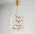 Rare pendant with brass base and glass by Orrefors. Designed by Carl Fagerlund for Fagerhult, Sweden mid-1900s. Measures:...