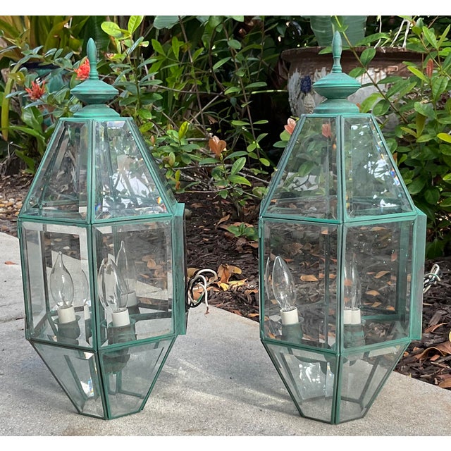 Elevate your home’s exterior or entryway with this elegantpair of vintage solid brass wall lanterns. These oversized...