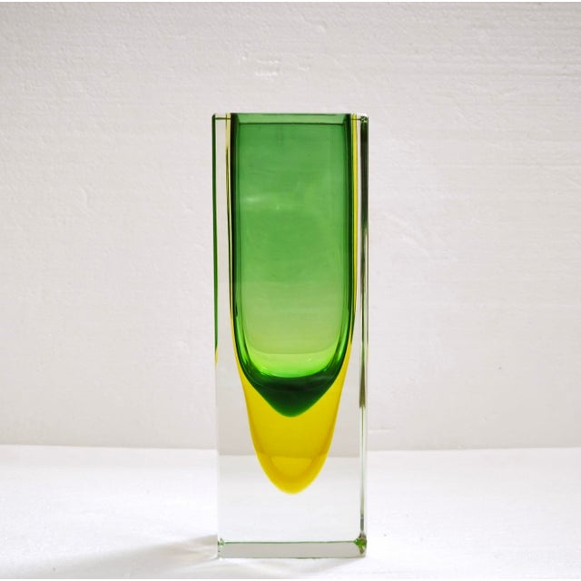 A remarkable Murano Sommerso art glass vase made in Murano, Italy, during the 1960s. This impressive sculptural vase...