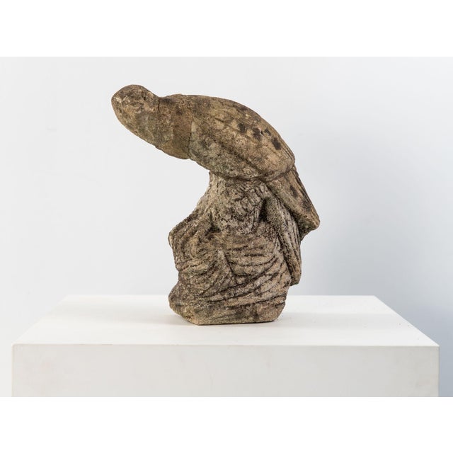 With its weathered stone finish and patina, this regal Belgian Mid 20th Century hawk or falcon exudes quiet strength and...