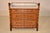 19th Century faux bamboo chest with marble top from France. The top is decorated with hand-turned finials and a three...