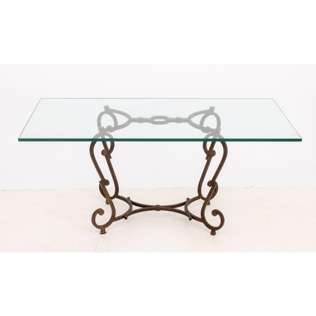 Mid-Century Modern Glass Top Wrought Iron Dining Table, French of Italian, the rectangular top above a scrollwork base....