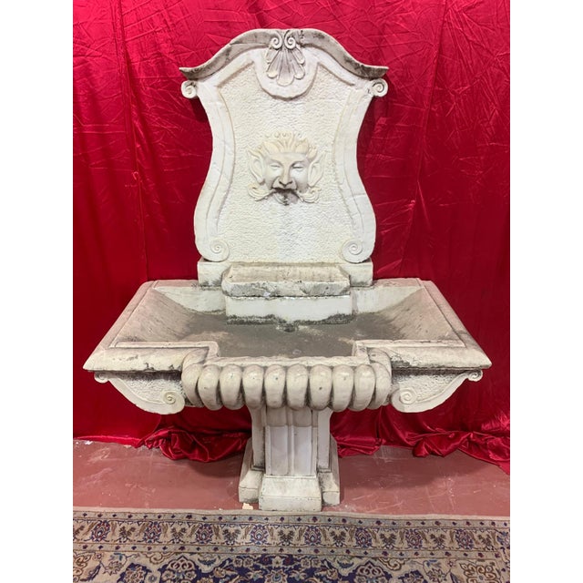 ancient marble fountain from 1750, a real sculpture This piece is attributed to the mentioned designer/maker. It has no...