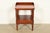 An exceptional American Colonial style bedside table or side table By Davis Cabinet Co. USA, Circa 1960s Carved solid...