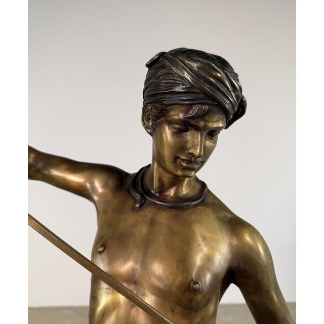 A striking large-scale bronze sculpture after Antonin Mercié’s celebrated “David” (often associated with the David and...