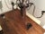 Antique non-electric chandelier designed for use with candles. The piece, which resembles the type of chandeliers that...
