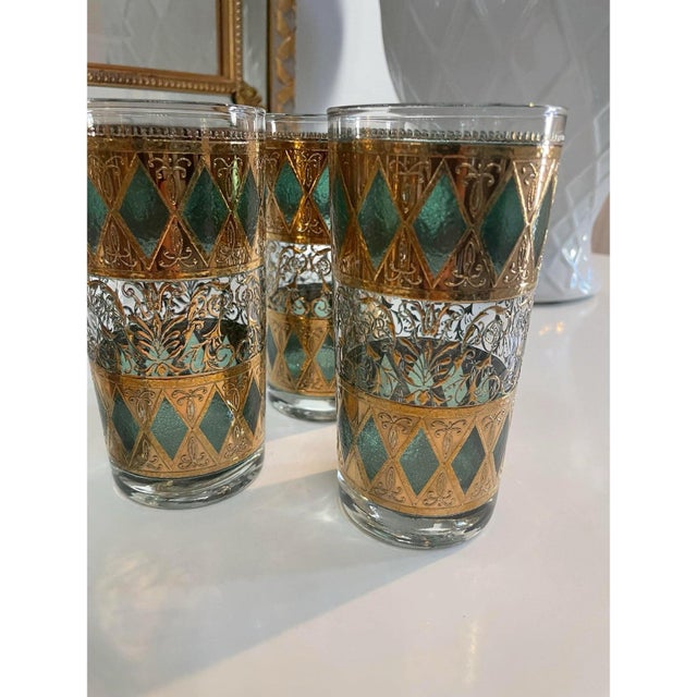 Offered is a vintage pitcher and glassware set by West Virginia Specialty Glass in the green Rainier pattern produced...