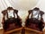 A striking pair of vintage Chinese armchairs, hand carved in solid rosewood with exceptional detail throughout. Each chair...