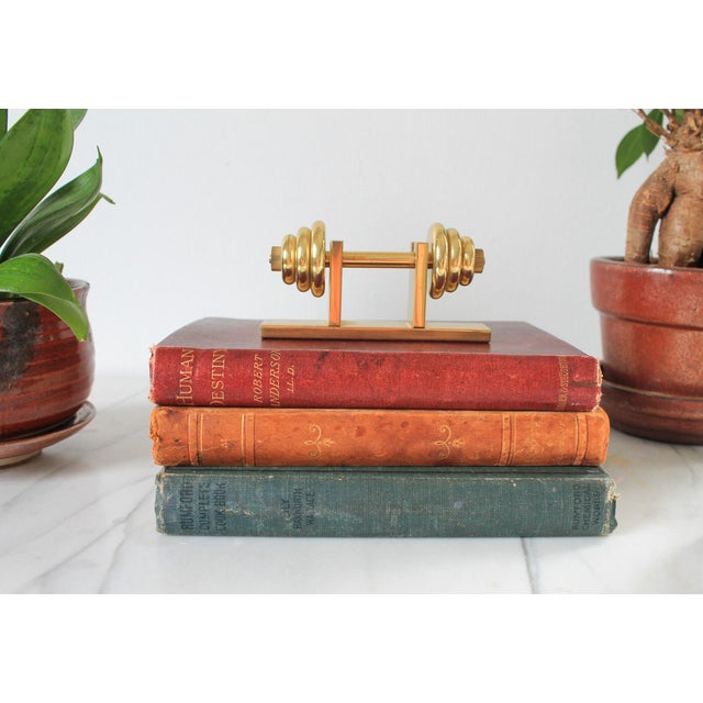 Vintage brass dumbbell paperweight. Minor age wear. No makers mark.