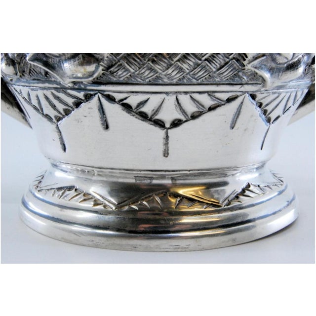 Silver Sugar Bowl with Floral Reliefs, Double Handle and Resting on a Grooved Base, in Very Good conditions. Designed 1890...
