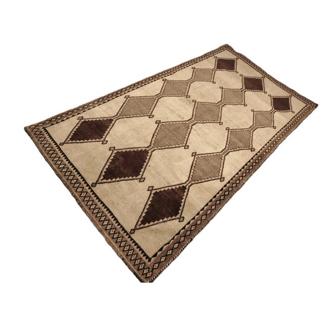 Vintage Persian Gabbeh rug in neutral undyed wool.in geometric pattern. Hand spun wool pile on wool foundation. Modern...