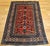 A rare gem from the early 1900s, this antique Caucasian Shirvan area rug stands out not only for its extraordinary...