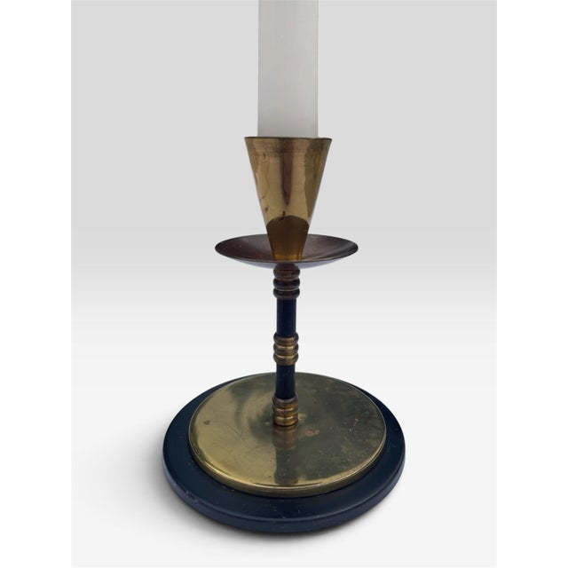 Constructed of brass and enamel these 1950s-1960s Midcentury Ljusstakar Sweden candleholders are sleek elegance. A...