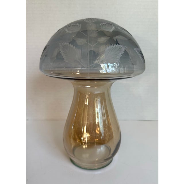 This beautiful vintage art glass mushroom features etched leaf designs in lighter smoky and warm golden glass tones,...