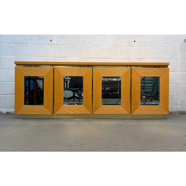 Striking vintage dresser and mirror set featuring a beautiful bohemian-inspired design with mirrored panels, bamboo-style...