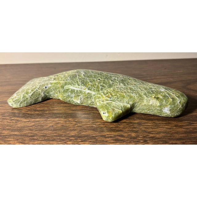 Up for sale is a Vintage Canadian Inuit Serpentine Stone Whale Carving (20th Century)! It measures 6 7/8” long. The piece...