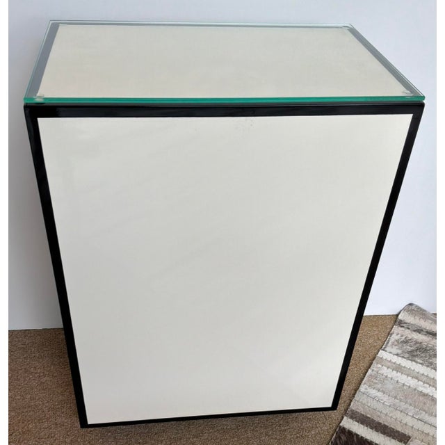 Stylish Currey & Company Modern White Lacquer Side Table, black trim, glass top, showroom floor sample