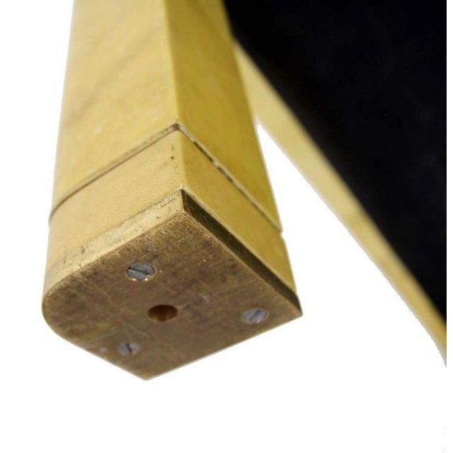 Very fine parchment coffee table on machined brass feet attributed of Karl Springer.