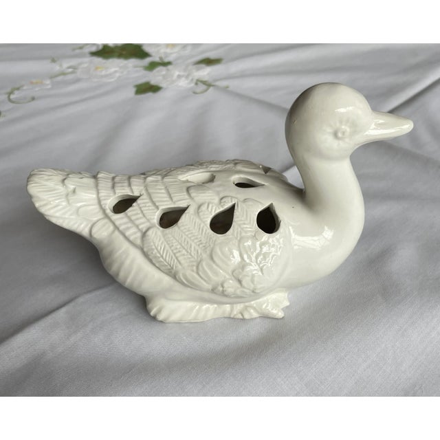 White Italian ceramic flower frog in the form of a duck. Made in the 1960s. m