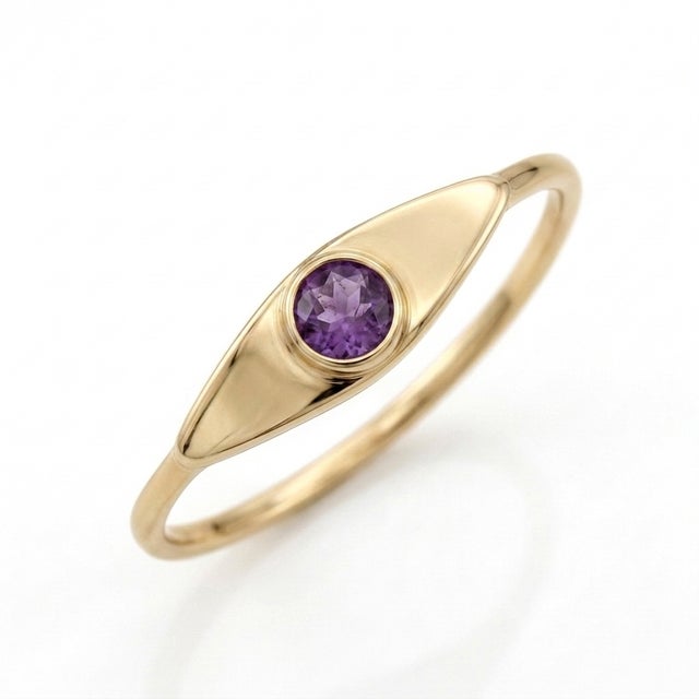 Channel regal charm with this sleek purple gemstone ring. A vivid, 3mm round-cut Amethyst is set seamlessly into a...