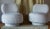 These lovely round accent chairs have vintage swivel frames that smoothly glide from side to side. Recently reupholstered...