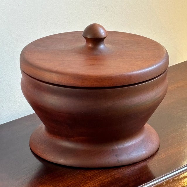 Offering a large Scandinavian Modern turned wood pedestal bowl /box with matching lid. This beautifully hand-crafted piece...