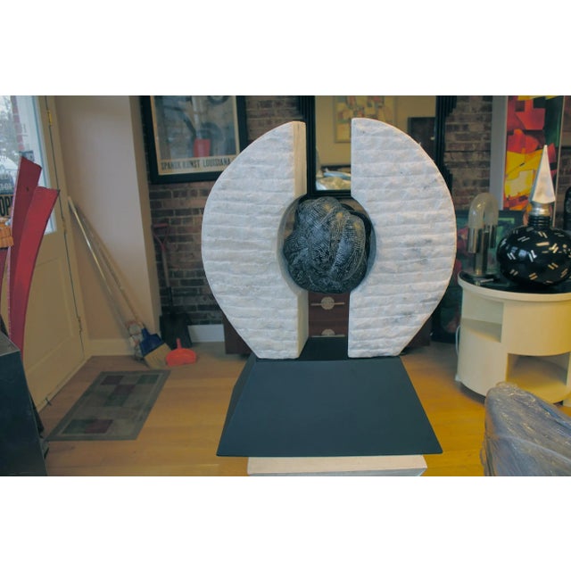 A wonderful large-scale and quite heavy three-dimensional fitted marble and steel sculpture. The base is steel and the two...