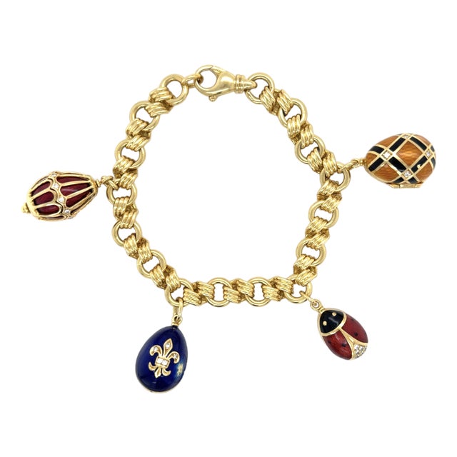 Fabergé, 18k Yellow Gold and Enamel Egg Charm Bracelet For Sale