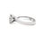 A classic diamond solitaire ring crafted in 18ct white gold, showcasing a beautiful champagne-coloured round brilliant cut...