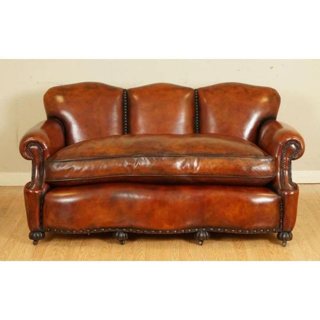 We are delighted to offer for sale this stunning hand dyed in whisky brown leather sofa. This sofa is truly one of a kind,...